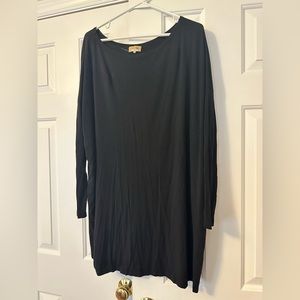 Black long sleeve dress, hangs off the shoulder a bit if you want it to!